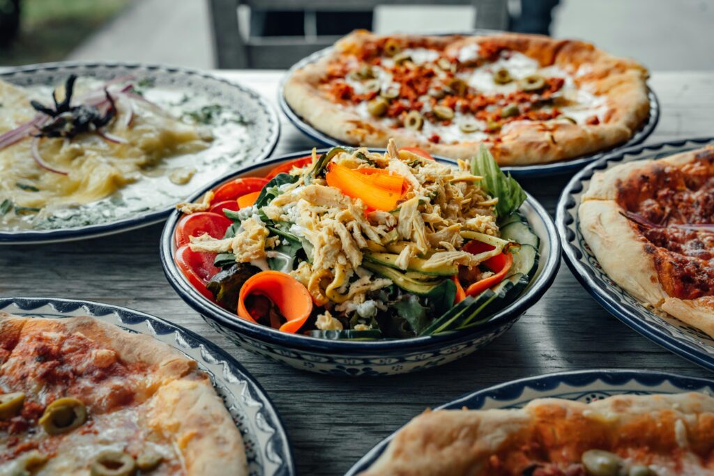 A vibrant spread of Mexican and Italian Pasta and Pizza dishes, perfect for a delicious meal.